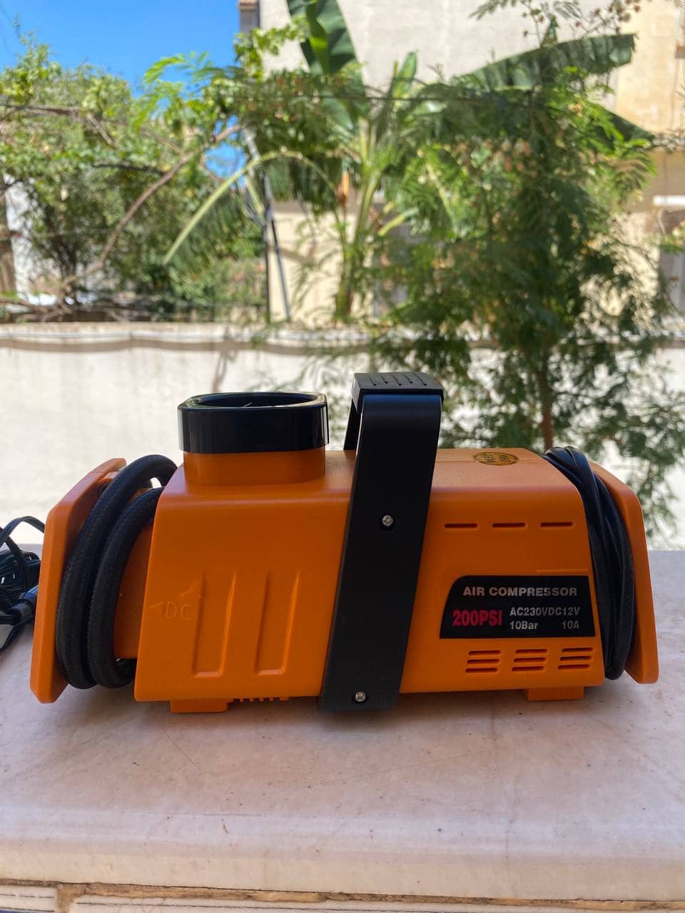 Compresseur d’aire a double adaptateur 220v/12v- 200psi - Orange - Électronique - صورة 9