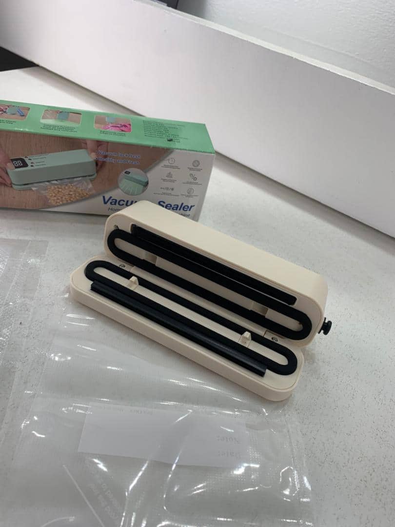 Mini scelleuse sous vide et Extracteur d’air portable 60 kPa avec 3 niveaux de température – جهاز تفريغ الهواء وغلق الأكياس — معاينة 10
