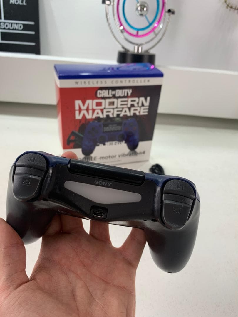 SONY DualShock Manette PS4 Sans Fil, Batterie Rechargeable (High Copy) – Edition Moderne Warfare - Jouet & Gaming - صورة حقيقية 8