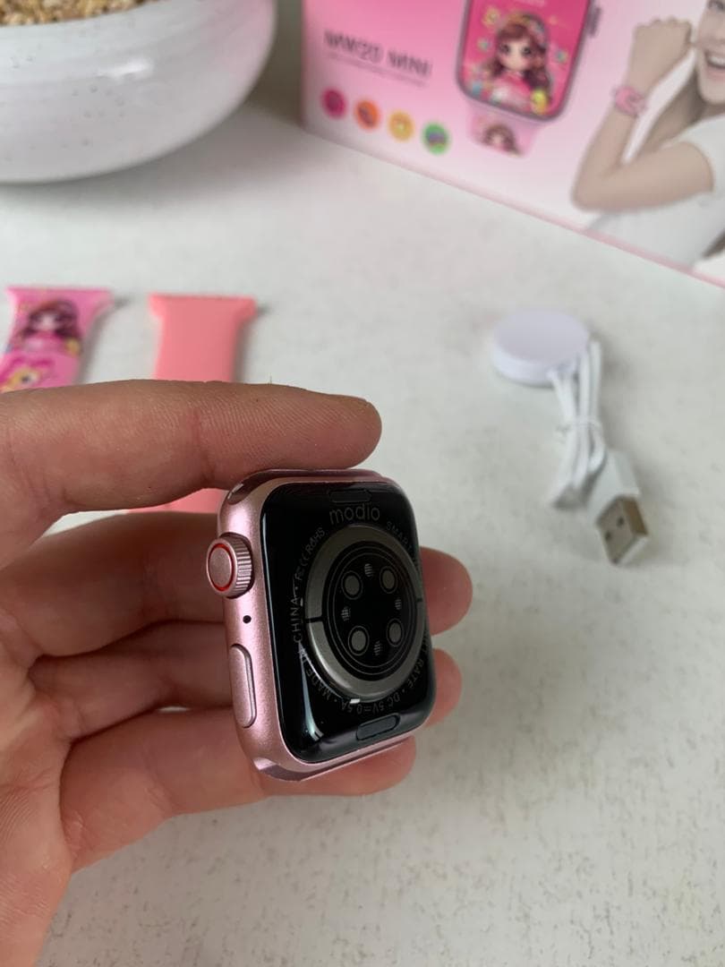 Smartwatch Modio MW20 Mini pour filles et garçons avec 2 bracelets – ساعة ذكية للأطفال - Électronique - صورة حقيقية 12