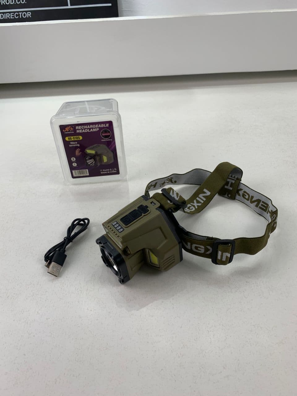 Lampe frontale rechargeable avec capteur de mouvement – مصباح مع مستشعر حركة — صورة حقيقية 8