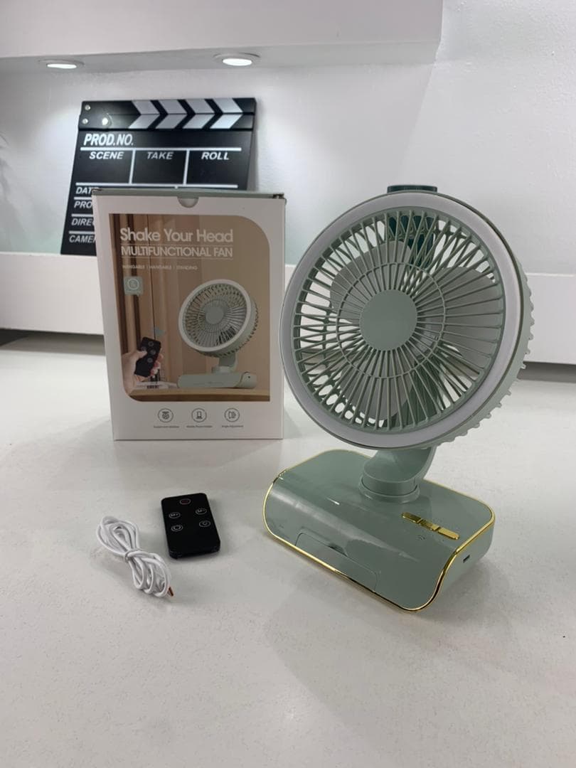Ventilateur de Bureau Rechargeable Rotatif avec Lumière LED – مروحة مكتب قابلة للشحن — صورة حقيقية 9