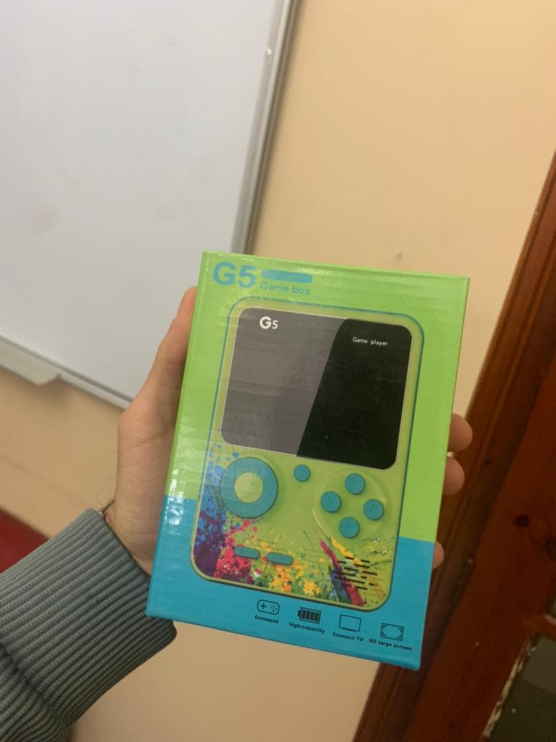 Console de jeu portable avec 500 jeux intégrés — صورة حقيقية 9