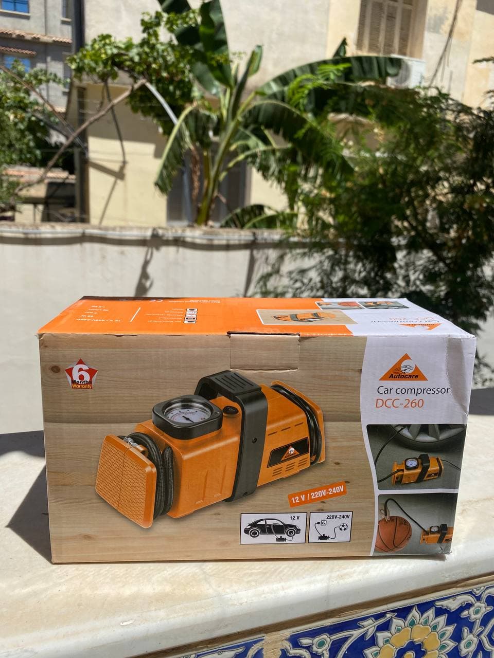 Compresseur d’aire a double adaptateur 220v/12v- 200psi - Orange — صورة حقيقية 11