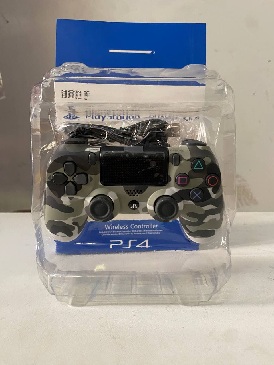 SONY DualShock Manette PS4 Sans Fil, Batterie Rechargeable (High Copy) – Gris Camouflage — صورة حقيقية 5